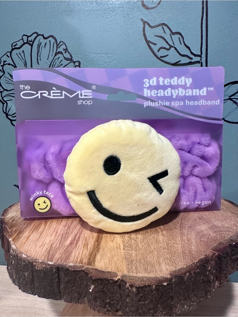 the CRÈME Shop Plush Winky Face Teddy Headband - Yellow